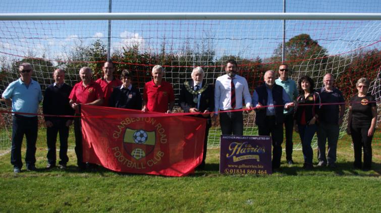 West Wales Football Association Chairman Roger Wood cuts the ribbon